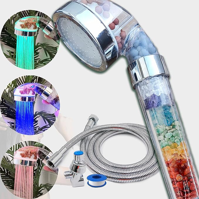 Colour changing LED shower head glowing in bathroom use